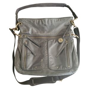 The Sak Black Leather Shoulder Bag with Gold Accents